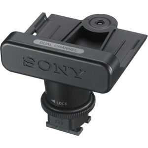 Adaptador de zapata multiinterfaz Sony negro, con "DUAL CHANNEL" grabado, para accesorios de cámara.