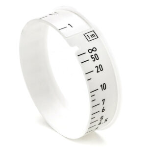Anillo de enfoque ARRI blanco premarcado con escala de 1 metro, para control de foco de cámara.